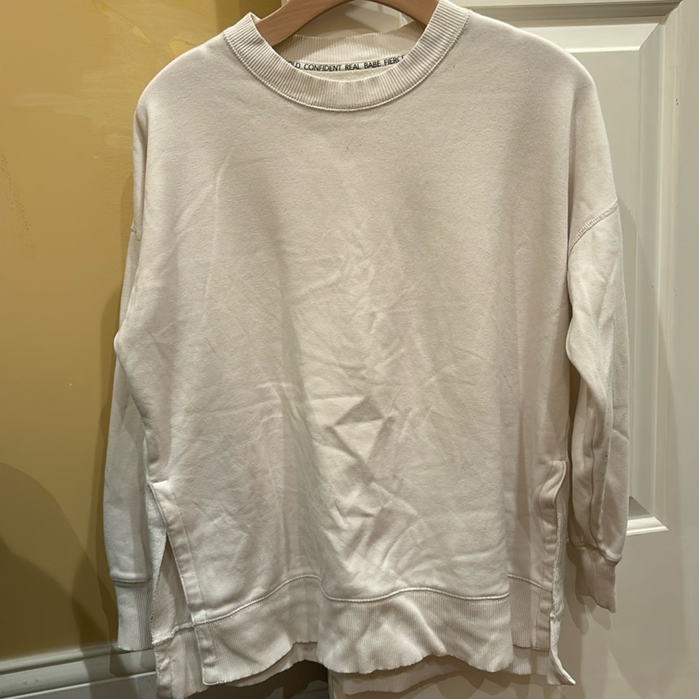 Cream aerie split hem crewneck
